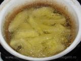 Cartofi prajiti de 2 ori in baie de ulei «1/3»